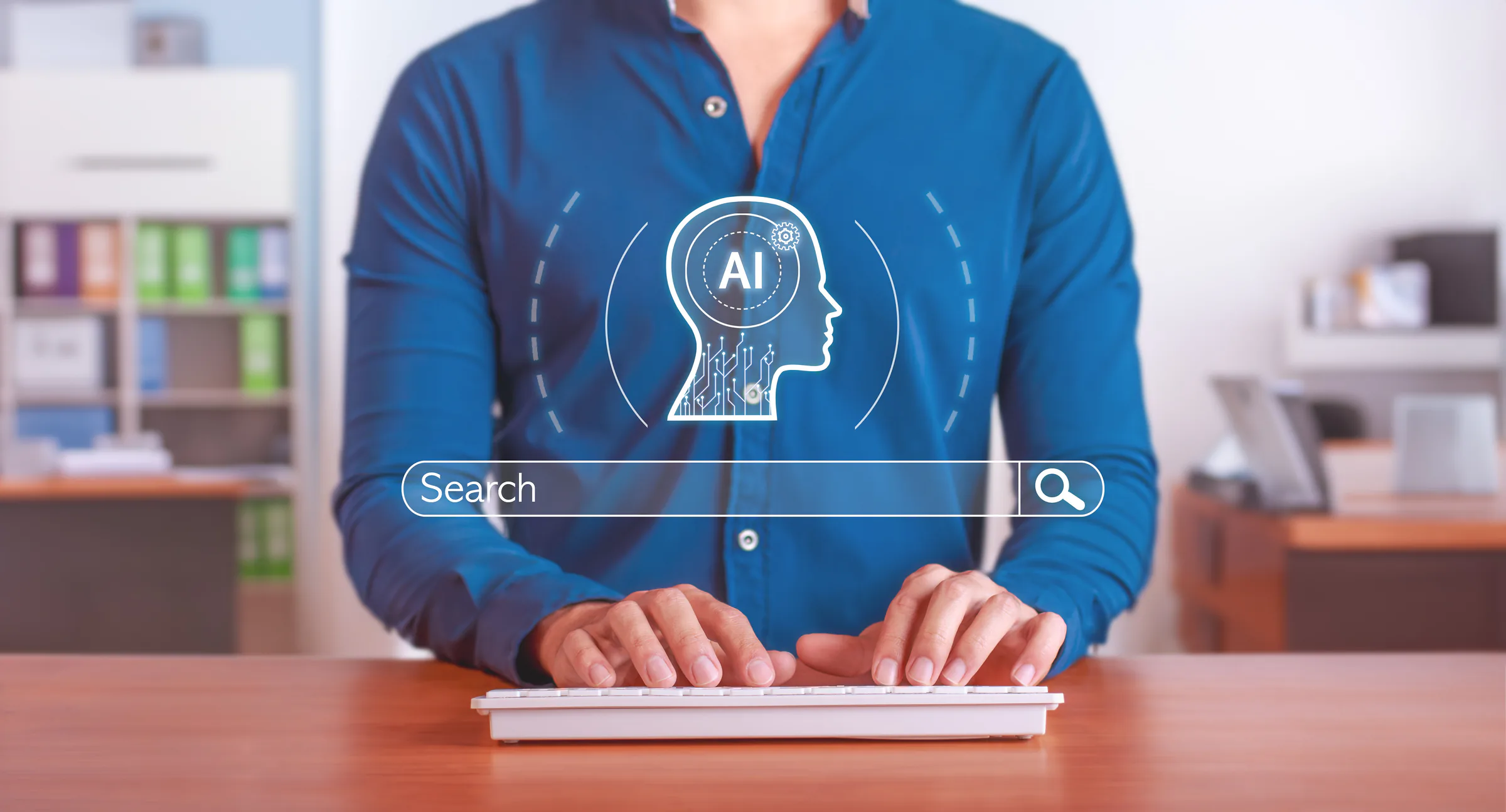 AI at Focus BC: Insights from Every Department – a professional concept image showing a person typing on a keyboard with an AI search interface overlay, symbolizing artificial intelligence enhancing workplace efficiency.